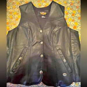 Authentic Harley Davison women’s vest, lined, never worn.
